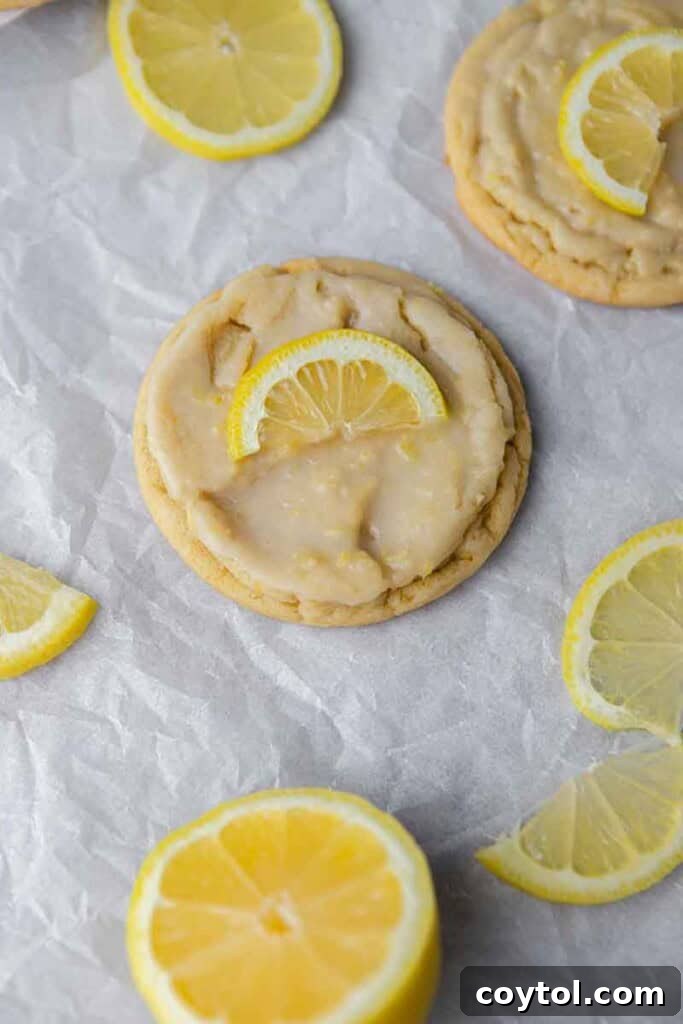 Effortless Bakery-Style Lemon Glaze Cookies 3 Overhead shot of CRUMBL lemon cookies arranged beautifully
