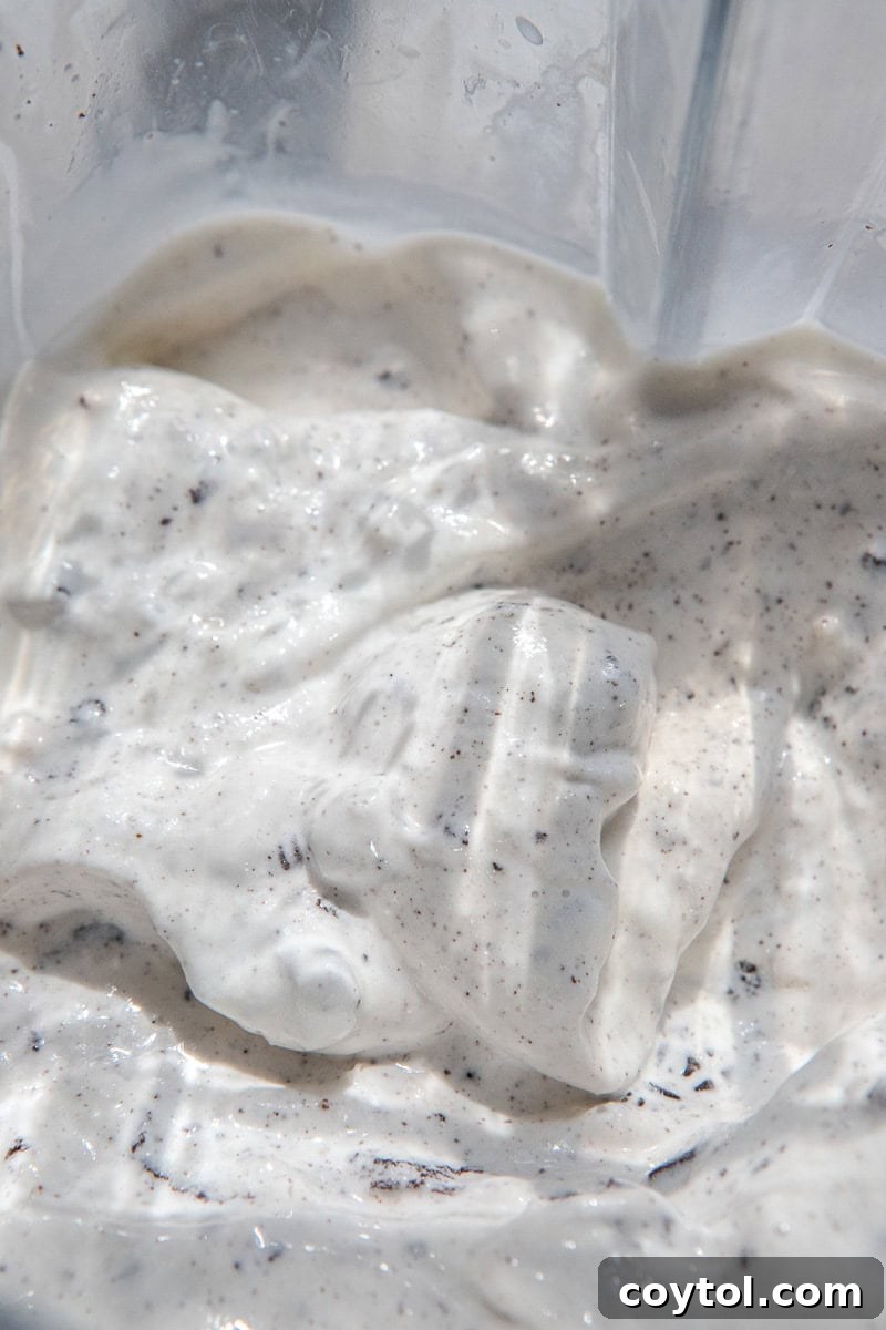 A freshly made homemade Oreo McFlurry served in a glass, ready to be enjoyed.