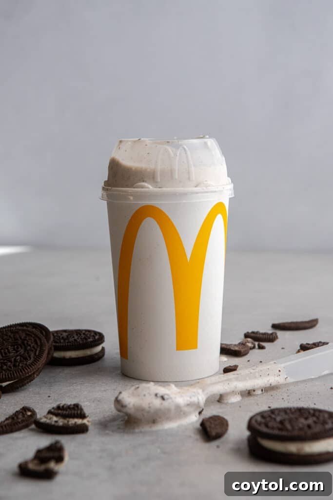 A single-serve homemade Oreo McFlurry in a glass cup, ready to be enjoyed.