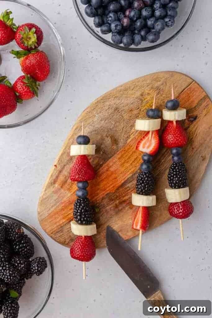4th of july fruit skewers on cutting board