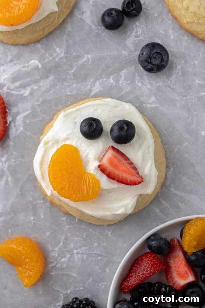 Fresh and Fruity Crumbl Cookie Pizzas 2 CRUMBL fruit pizza cookies with vibrant fresh fruit toppings