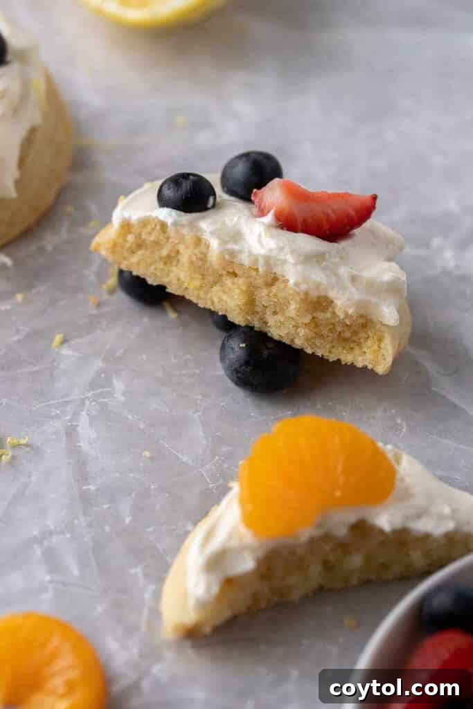 Fresh and Fruity Crumbl Cookie Pizzas 10 Fruit pizza cookie broken in half, showing soft interior