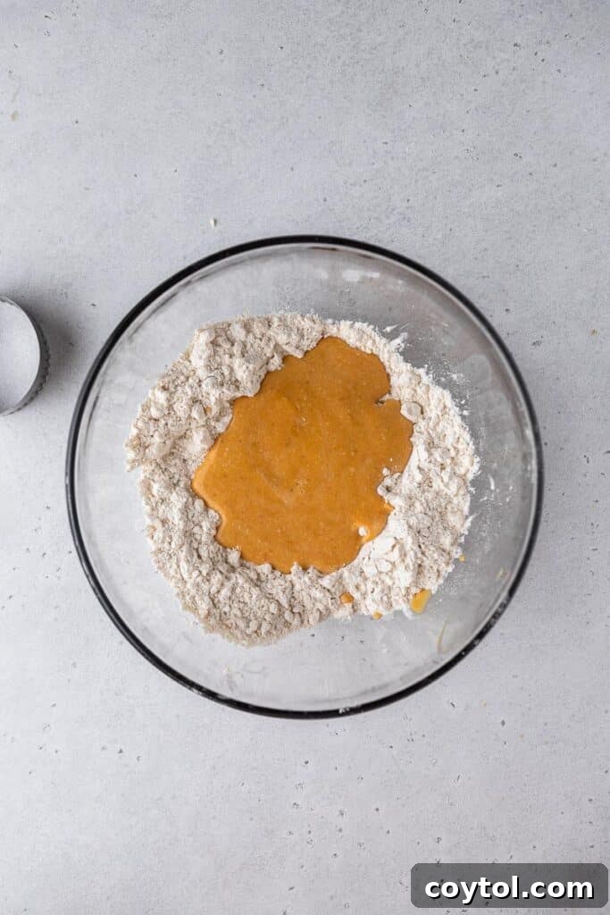 Mixing pumpkin buttermilk with flour