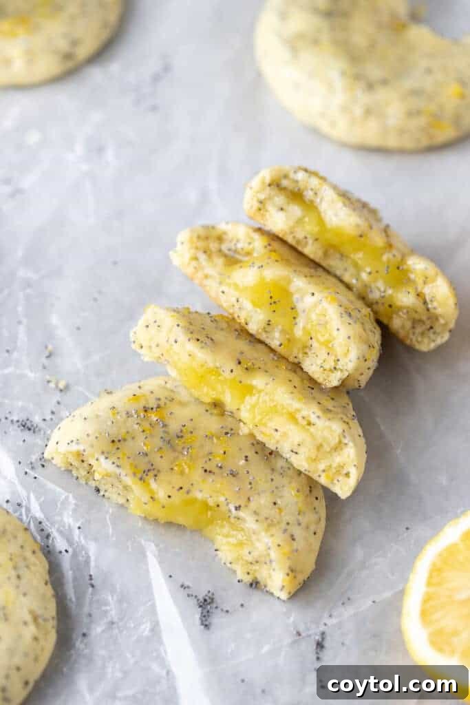 lemon poppy seeds broken in half on parchment paper