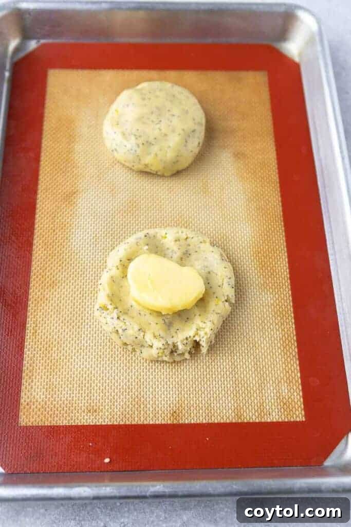 cookie dough with frozen lemon curd in the center