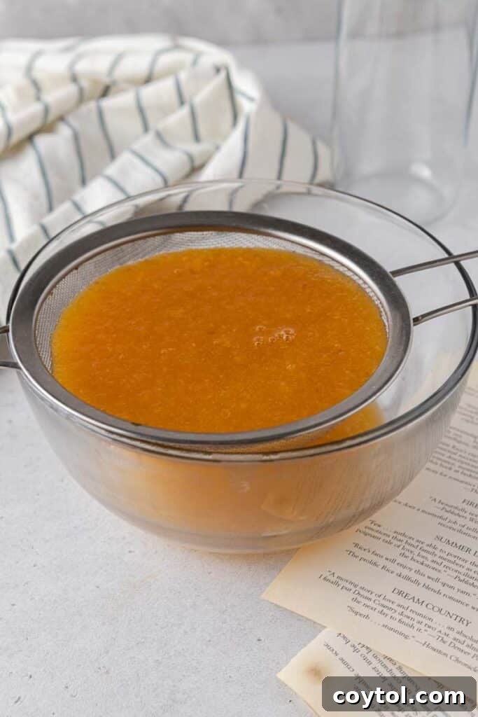 Peach puree in a sieve