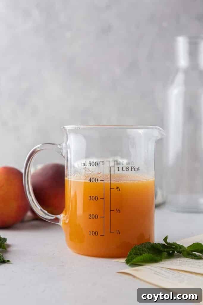 peach syrup in a glass