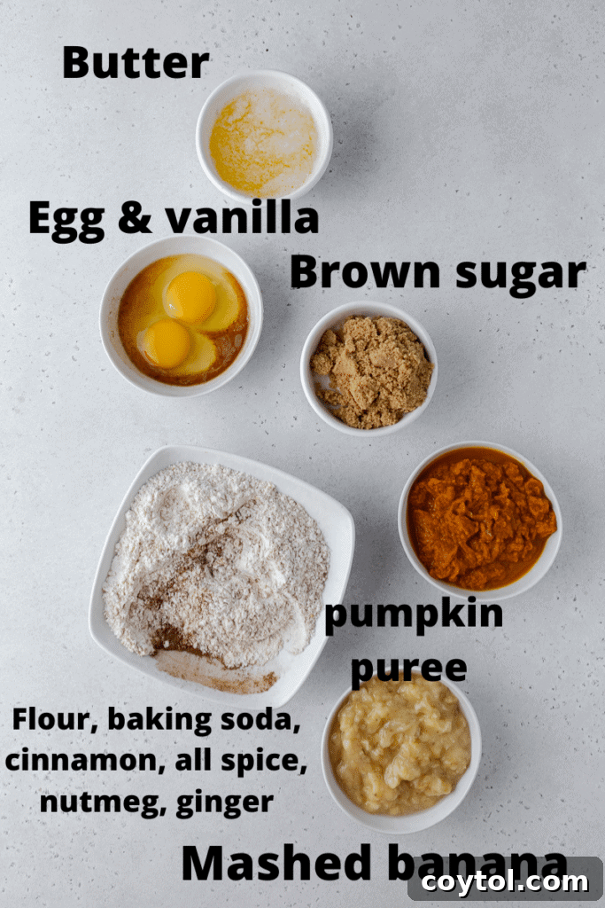 Various essential ingredients laid out on a surface, ready for making pumpkin banana bread, including ripe bananas, pumpkin puree, flour, sugars, and spices.