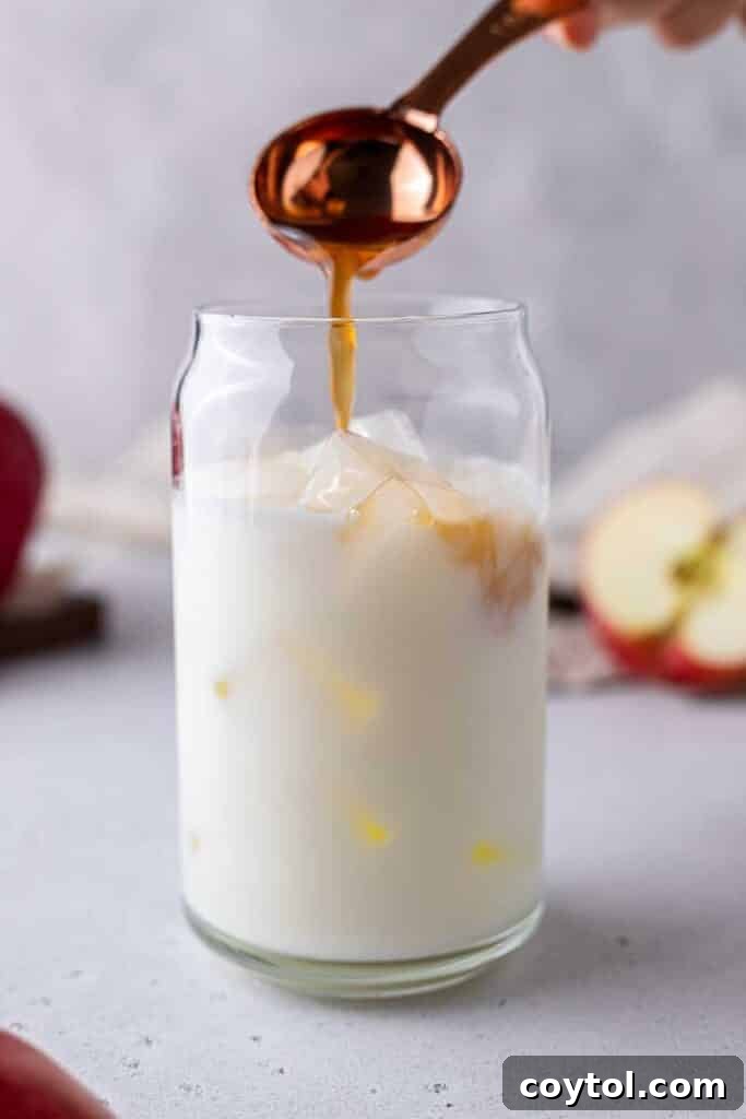 Starbucks Apple Crisp Macchiato Golden Warmth or Chilled Delight 14 Adding apple simple syrup to milk