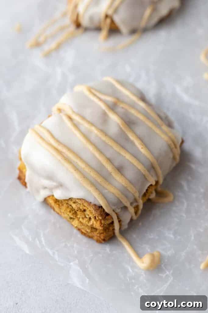 Square pumpkin scone with rich glaze and orange drizzle