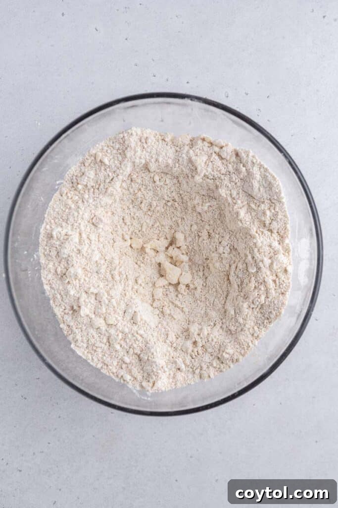 Dry mixture in a bowl with a well in the center