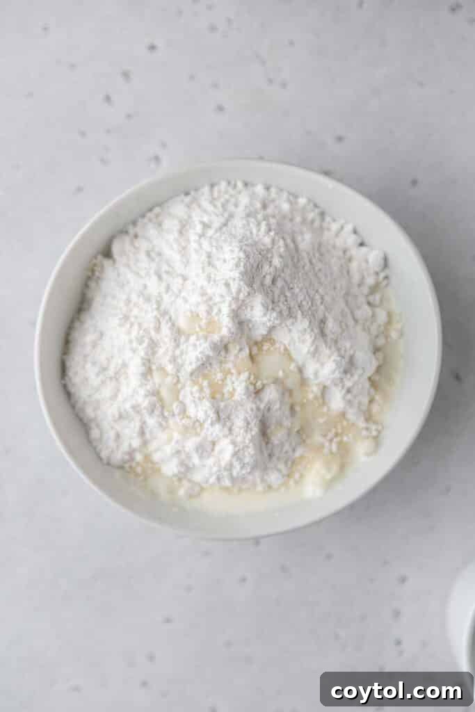 Confectioner sugar in a bowl for glaze
