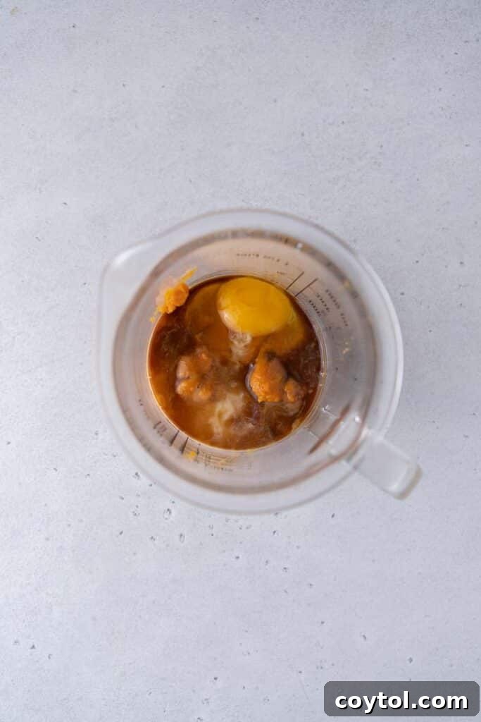 Wet ingredients in measuring cup before mixing
