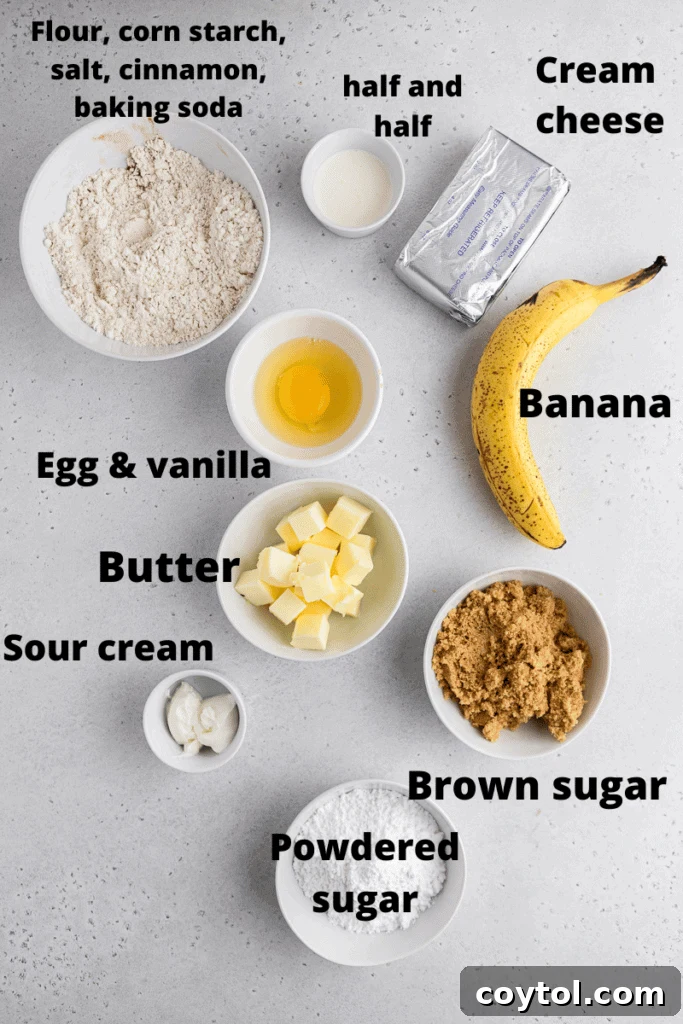 Various ingredients for Crumbl banana bread cookies laid out on a kitchen counter, including bananas, flour, sugar, and butter.