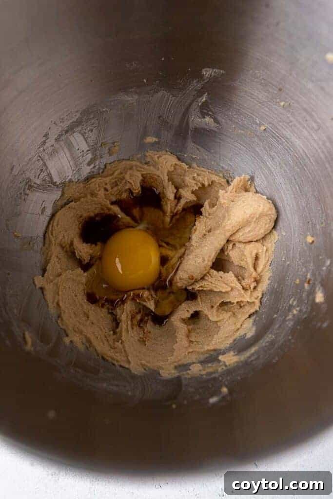 Creamed butter with sugar in a mixing bowl, showcasing the first step of the recipe.