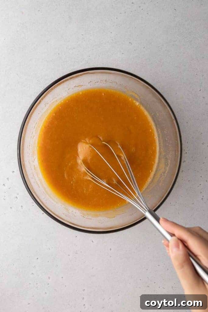 Starbucks Dupe Pumpkin Cream Cheese Muffins 11 Wet ingredients in a bowl