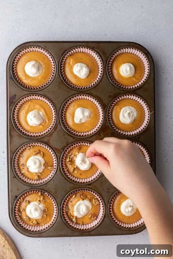Starbucks Dupe Pumpkin Cream Cheese Muffins 14 Muffin batter in muffin tin