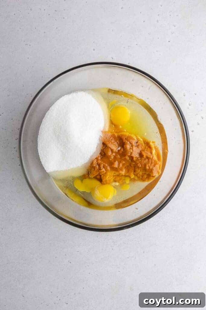 Starbucks Dupe Pumpkin Cream Cheese Muffins 9 Wet ingredients in a bowl