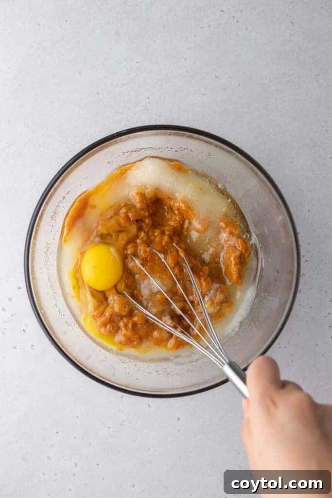 Starbucks Dupe Pumpkin Cream Cheese Muffins 10 Wet ingredients in a bowl