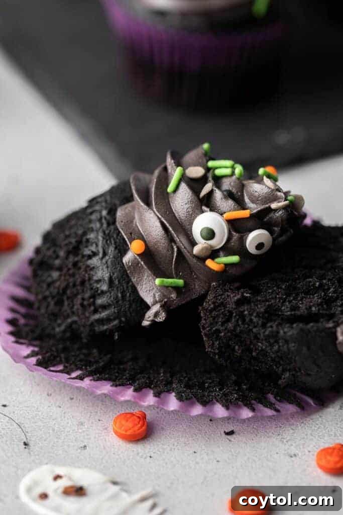 Spooky Black Velvet Monster Cupcakes 17 Platter of Halloween monster cupcakes, black velvet cupcakes with various decorations