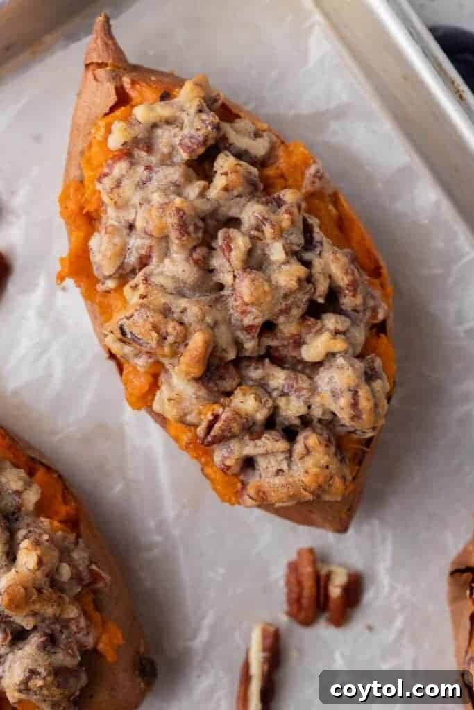Twice-Baked Pecan Pie Sweet Potatoes 2 Pecan pie twice baked sweet potato with creamy maple mashed filling and chunky cinnamon pecan streusel baked until golden and bubbling