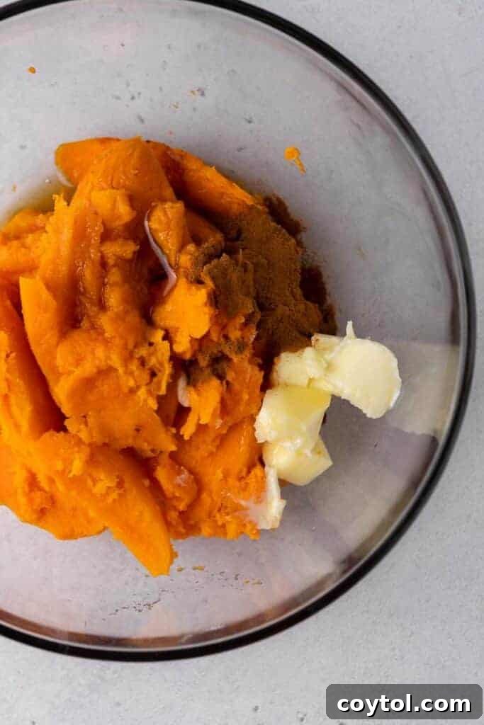 Twice-Baked Pecan Pie Sweet Potatoes 6 Mash in a bowl with butter cinnamon and maple syrup before mixing