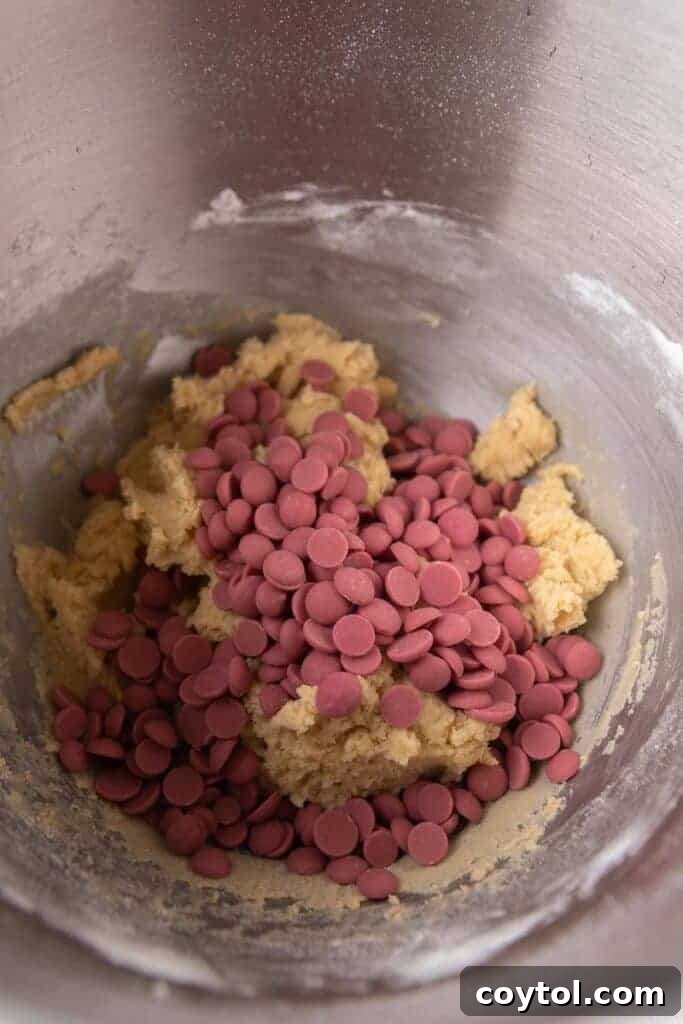 Cookie dough with ruby chocolate chips in a bowl