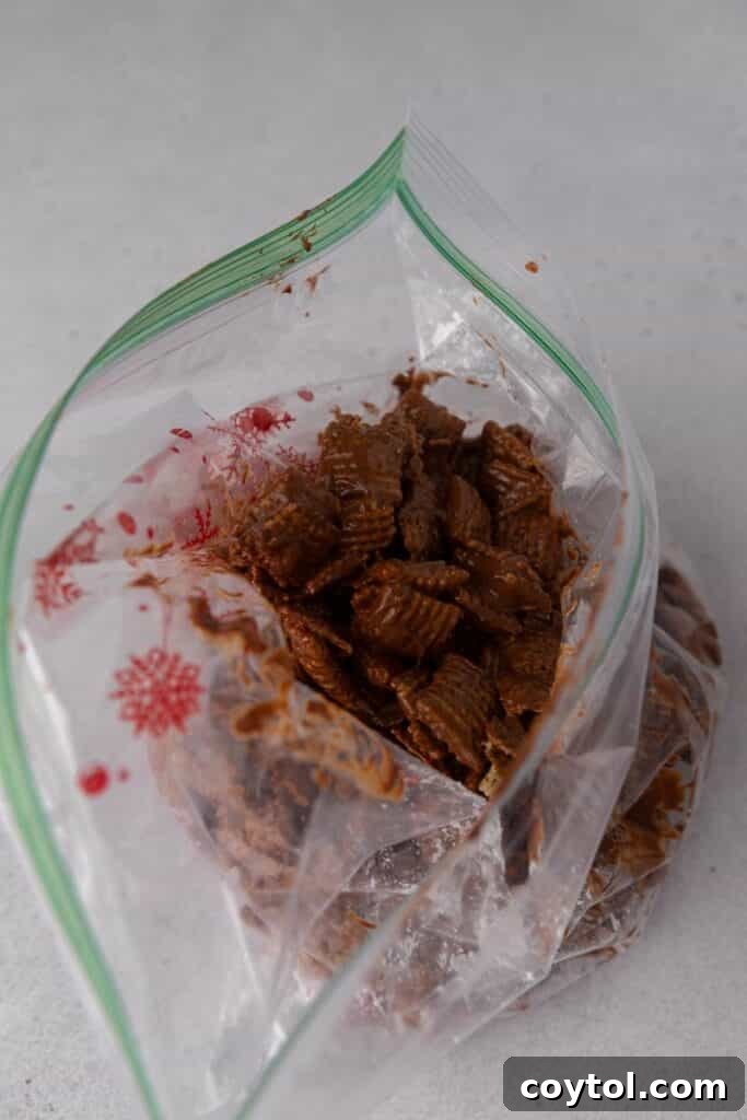 Chocolate-coated cereal in a plastic bag before adding powdered sugar for puppy chow
