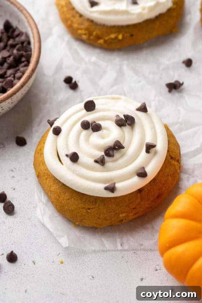 Beautifully frosted pumpkin cookies, ready to be enjoyed
