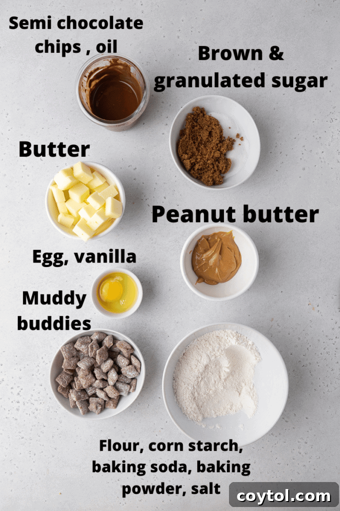 A flat lay image showing all the ingredients required for muddy buddy cookies, including peanut butter, flour, sugar, chocolate chips, and Chex cereal