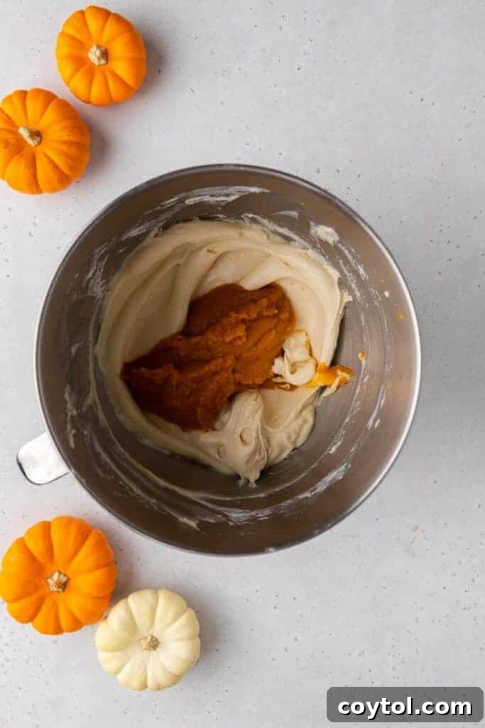 Pumpkin puree and vanilla extract added to the cream cheese mixture.