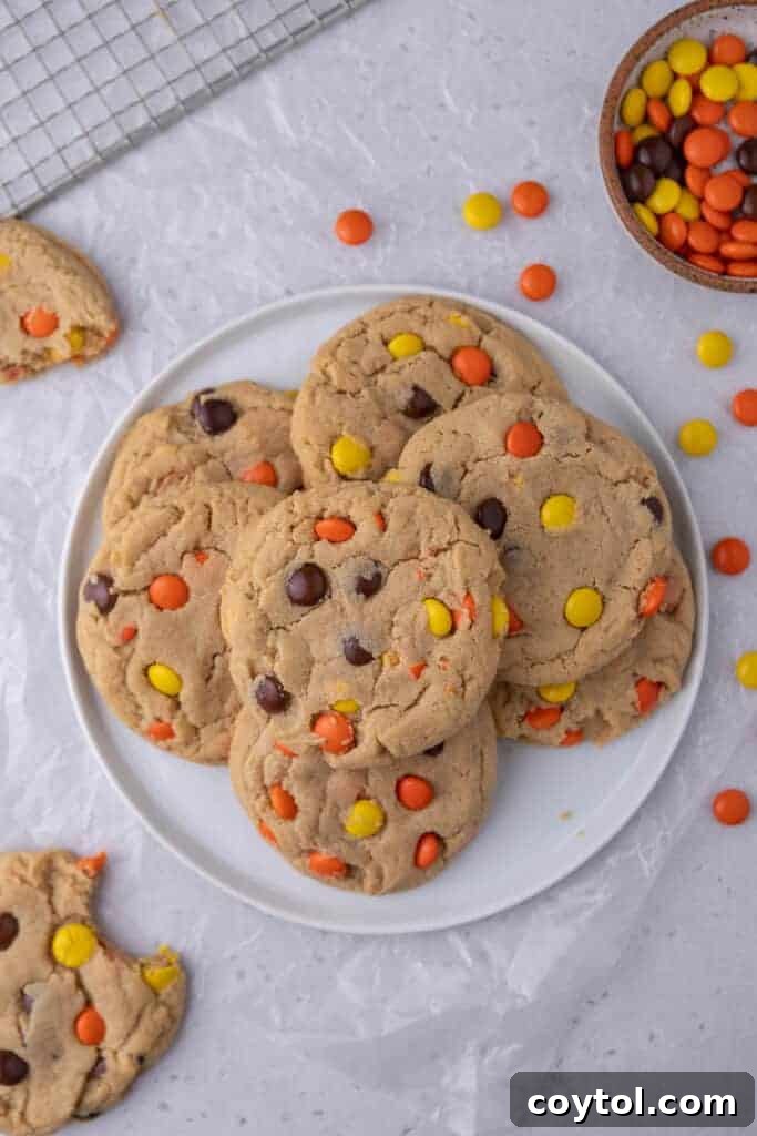 Crumbl peanut butter Reese's pieces cookies on a plate