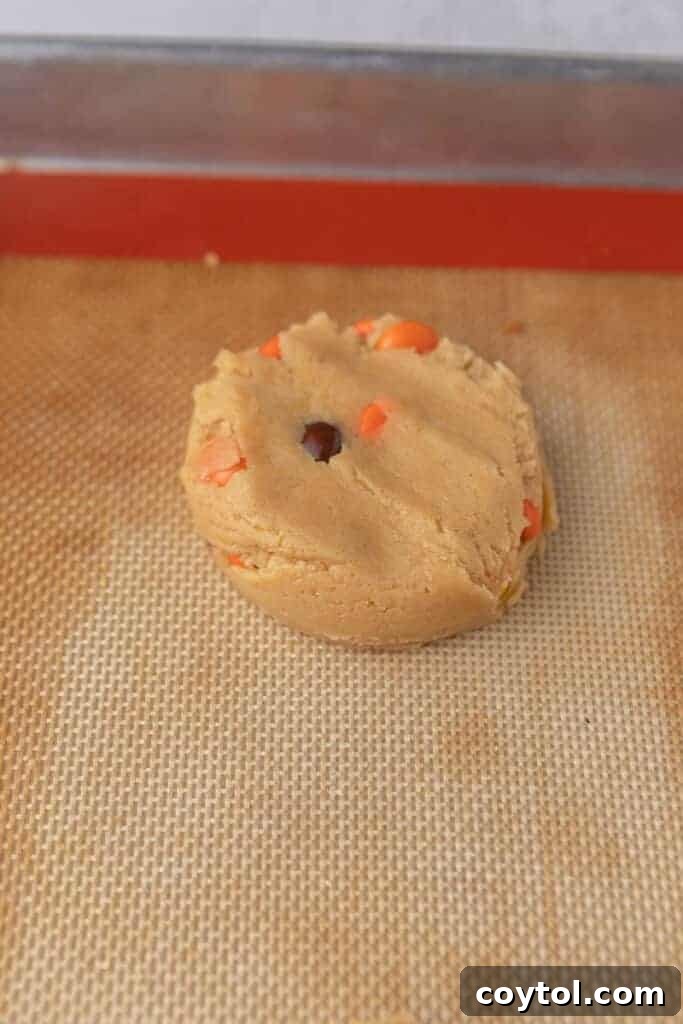 Flattened cookie dough on baking sheet