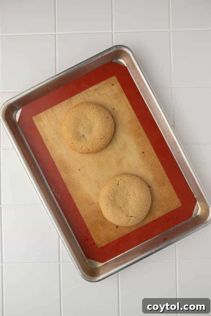 Baked thick cookies on baking sheet