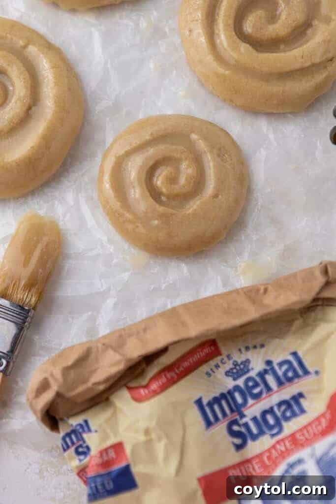 Crumbl Honey Bun Cookies: Sweet Perfection 2 Imperial sugar featuring honey bun cookie, warm and glazed to perfection