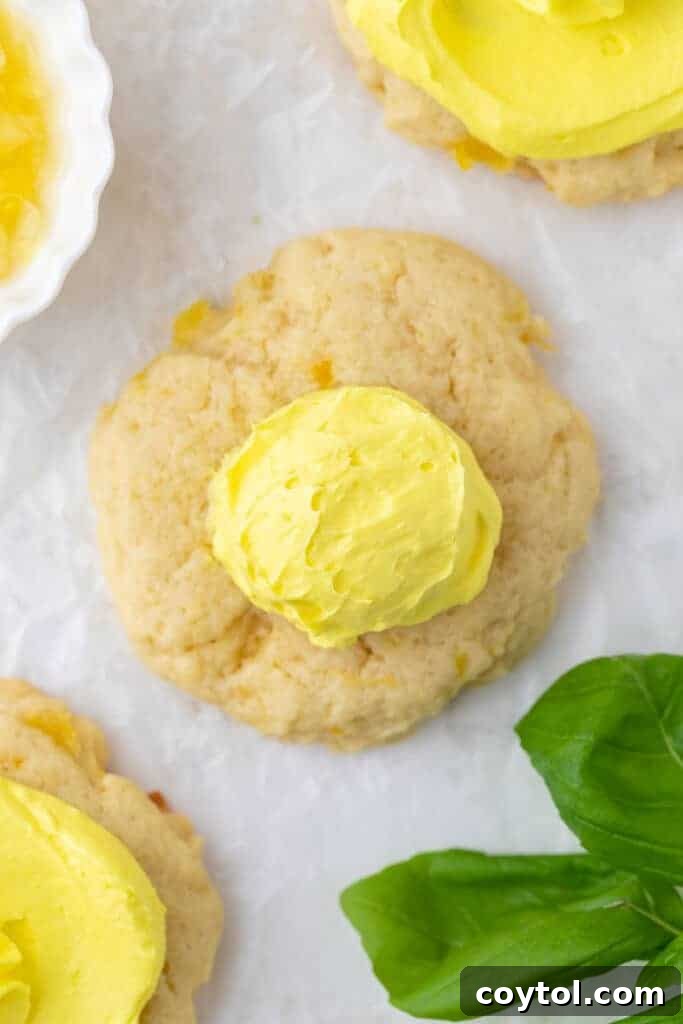 Dole Whip frosting being piped onto a cookie