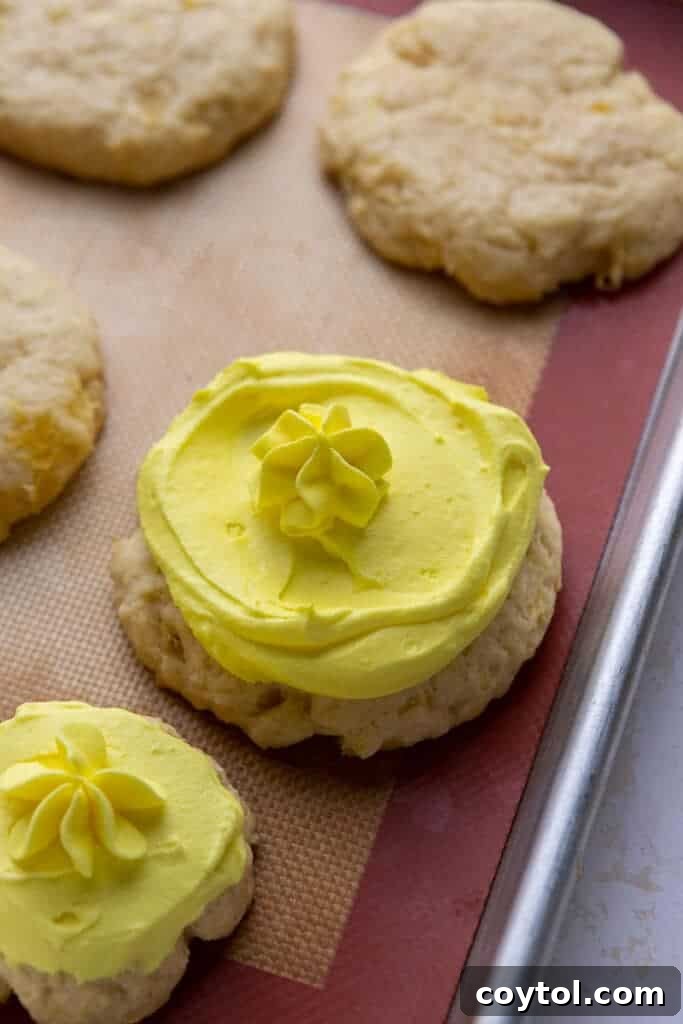 Finished Crumbl Dole Whip Cookies with frosting