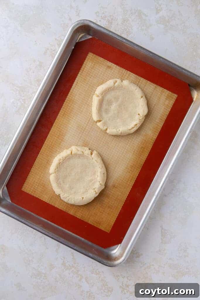 Crumbl's Sublime Chilled Banana Cream Pie Cookies 9 Another view of the shaped cookie dough on the baking sheet before baking.