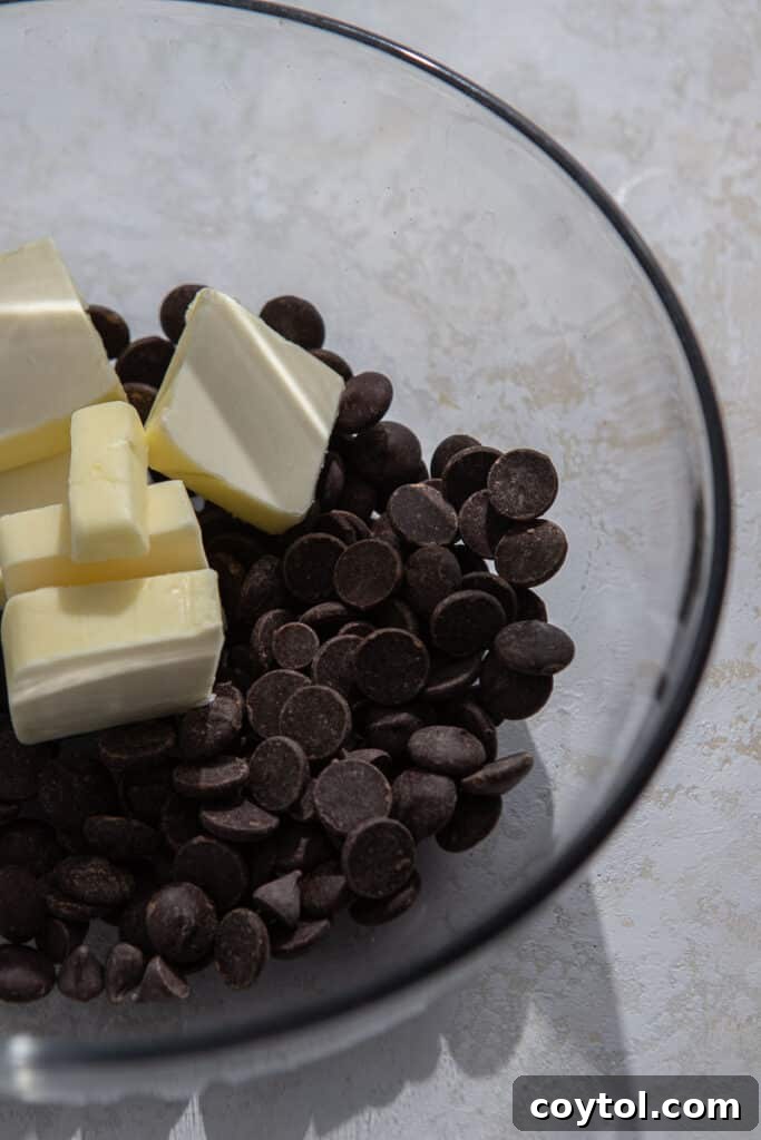 Chocolate and butter melting in a bowl for brownies