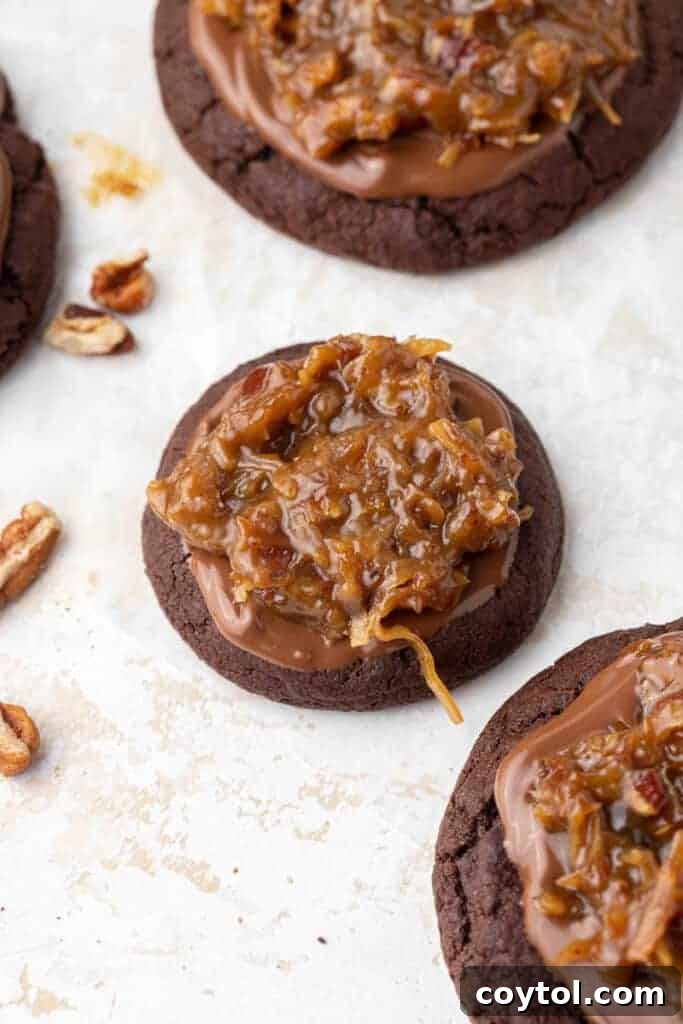 A platter of mini Crumbl German Chocolate Cake Cookies, perfect for catering or smaller portions.