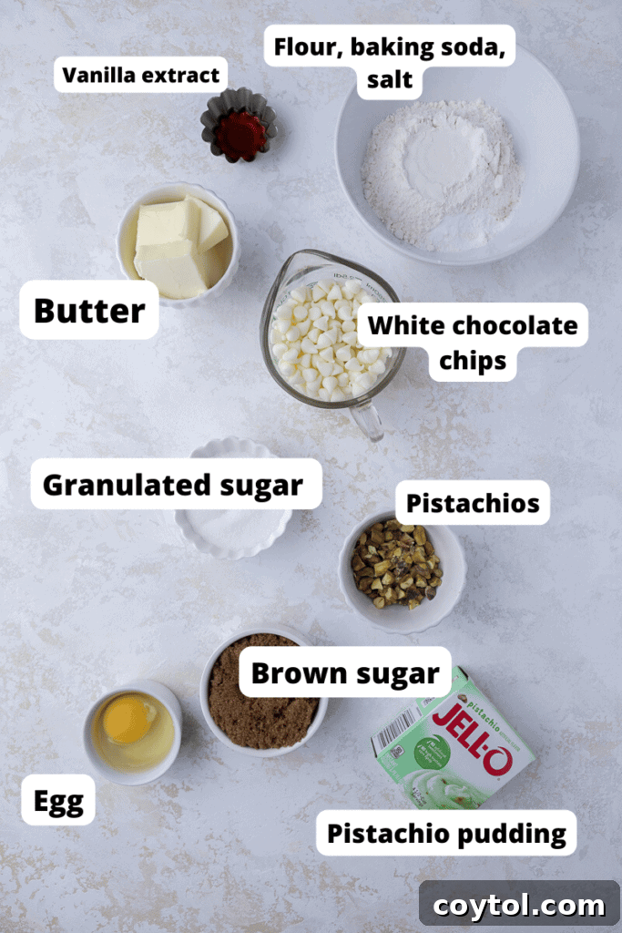 A collection of ingredients laid out for making pistachio pudding cookies.