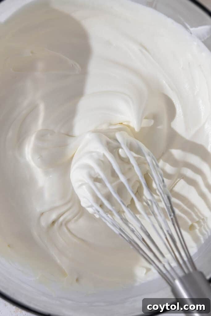 Lazy Caramel Macchiato Tiramisu Cups 5 Perfectly whipped cream in a mixing bowl