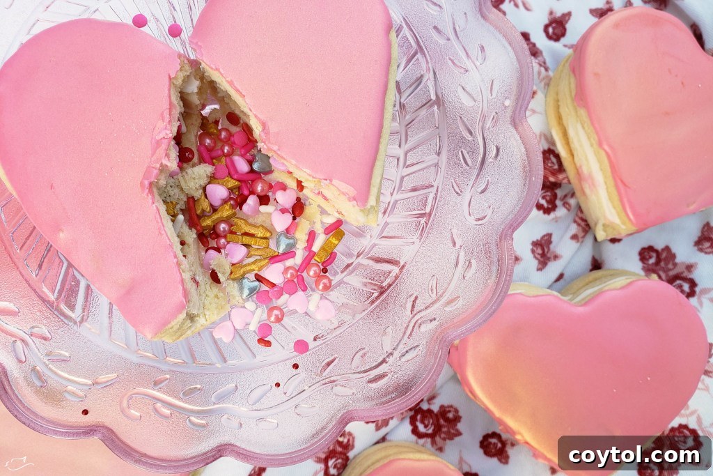 18 Irresistible Valentine's Day Cookie Ideas 22 Unique Valentine's Day piñata cookies filled with colorful candies, perfect for an adventurous baker.