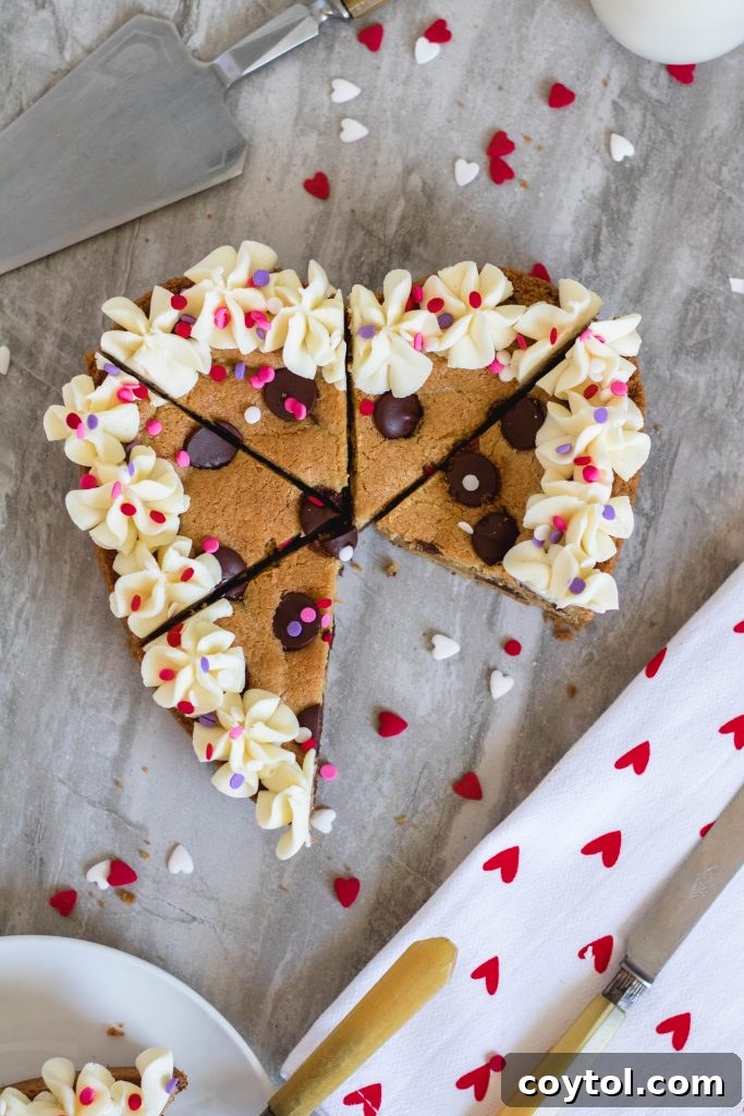 18 Irresistible Valentine's Day Cookie Ideas 5 A beautifully decorated heart-shaped chocolate cookie cake, perfect for a romantic Valentine's Day dessert for two.