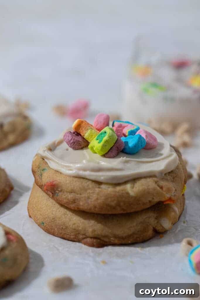 Stacked Crumbl frosted lucky charms cookies