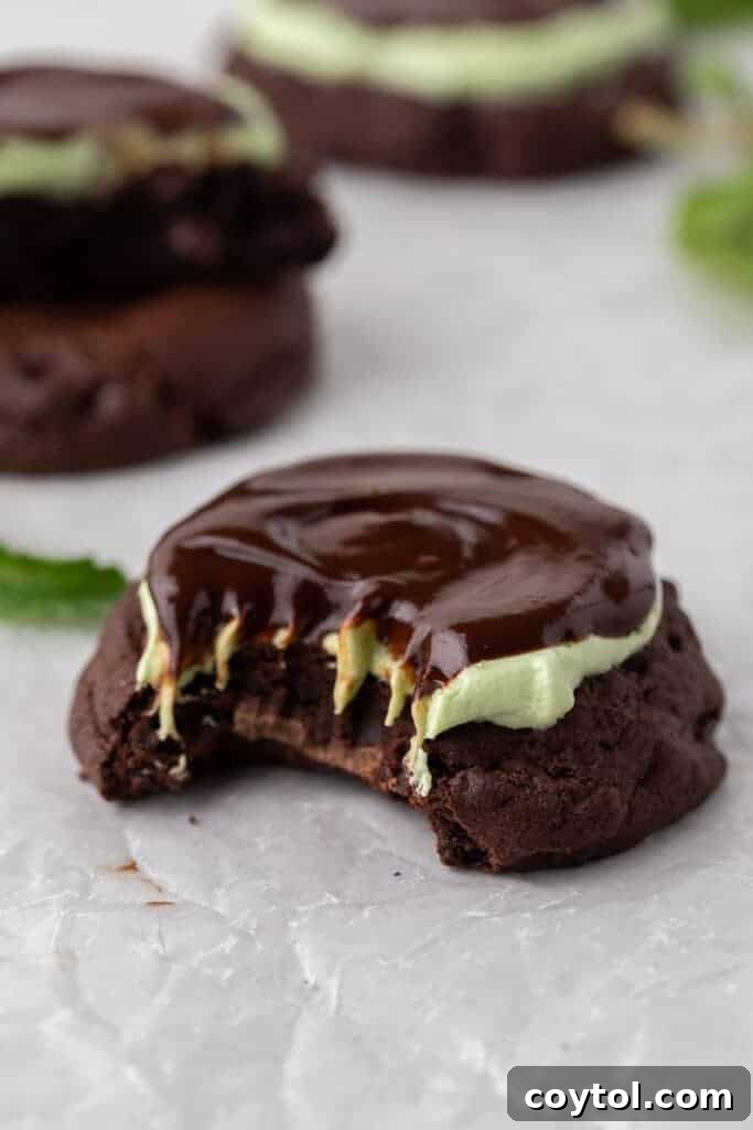 Crumbl mint brownie cookie with. bite taken out of it