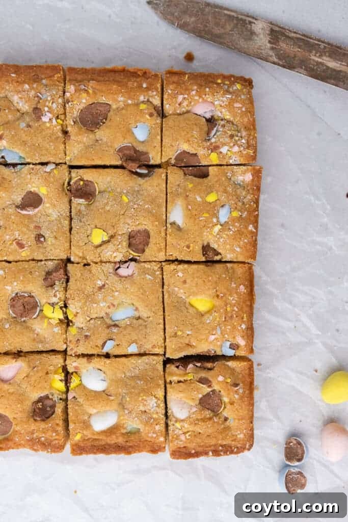 A freshly baked pan of 8x8 Easter Mini Egg Blondies, ready to be cut