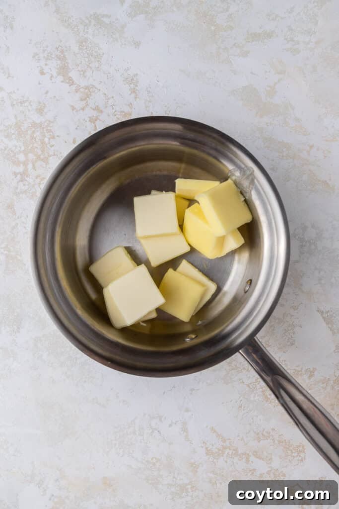 Irresistible Brown Butter Chocolate Chip Blondies 7 butter in saucepan melting