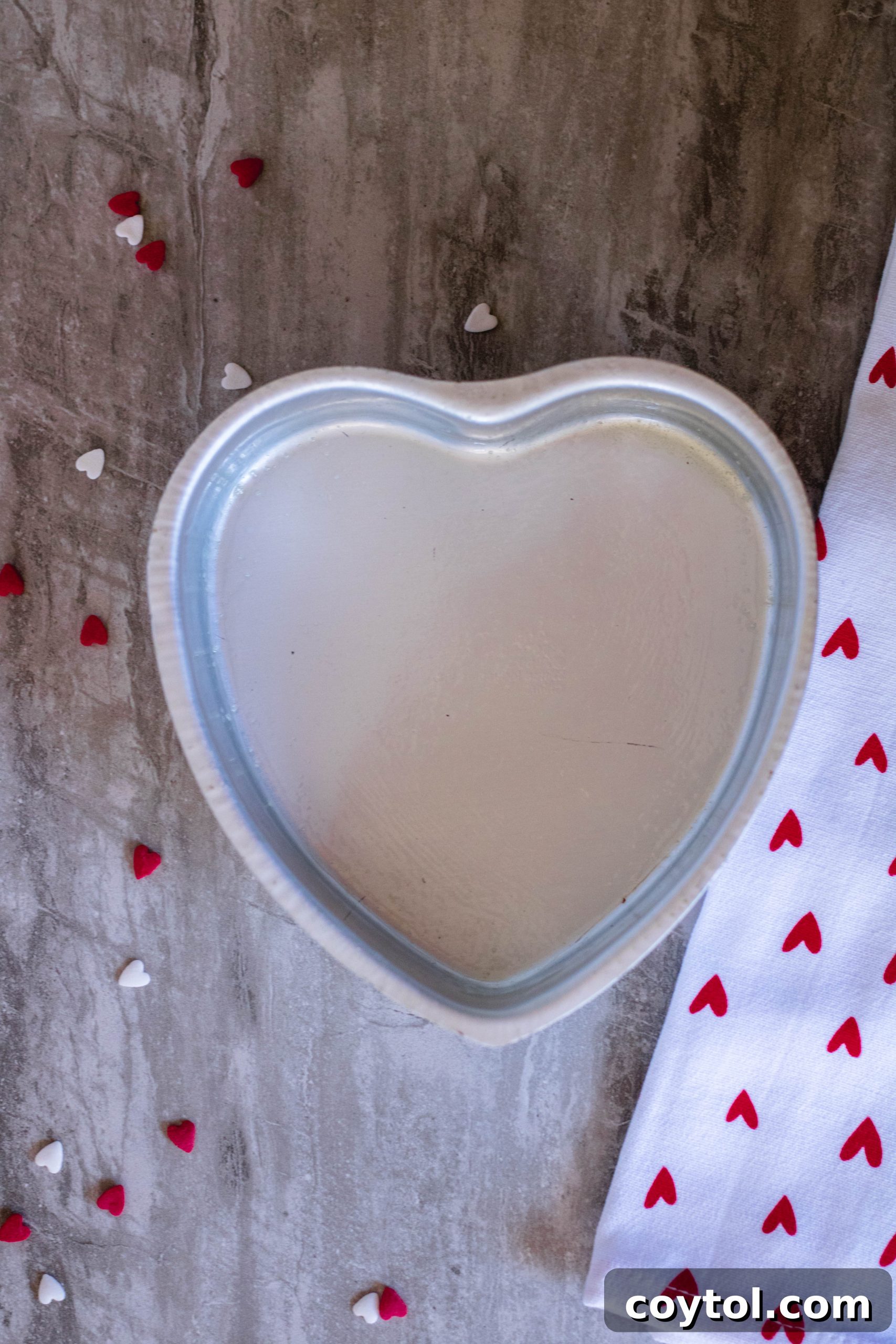 Greased and floured 6-inch cookie cake heart pan