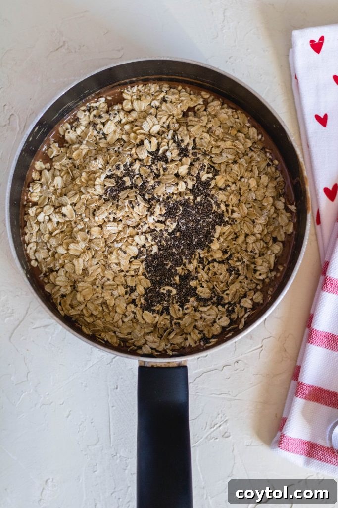 Heart-Healthy No-Bake Valentine's Delights 14 Adding the oats and chia to the liquid mix